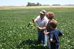 ron haugen, susan meland, paul meland at ND Farm 2006
